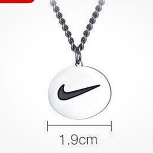 Swoosh pendant with chain